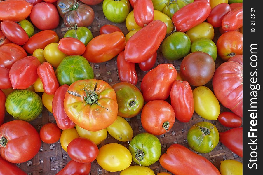 Green peppers for sale at a local farmers market