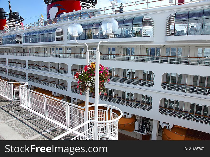 A side view of a cruise ship at Canada Place in Vancouver BC Canada. A side view of a cruise ship at Canada Place in Vancouver BC Canada.