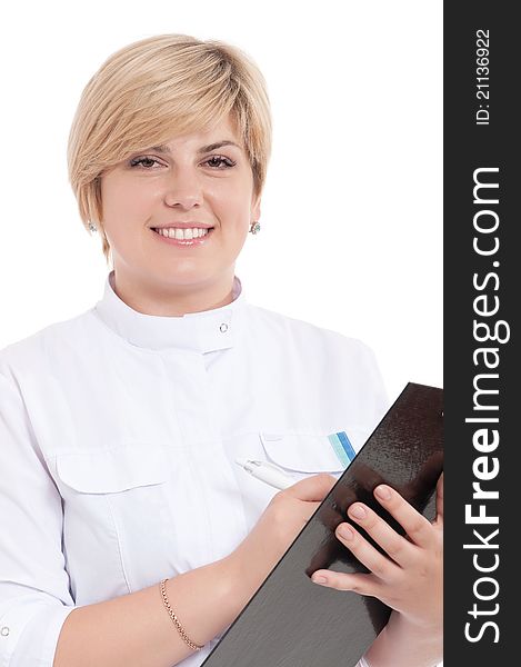 Portrait of smiling female doctor holding a clipboard - isolated over a white background