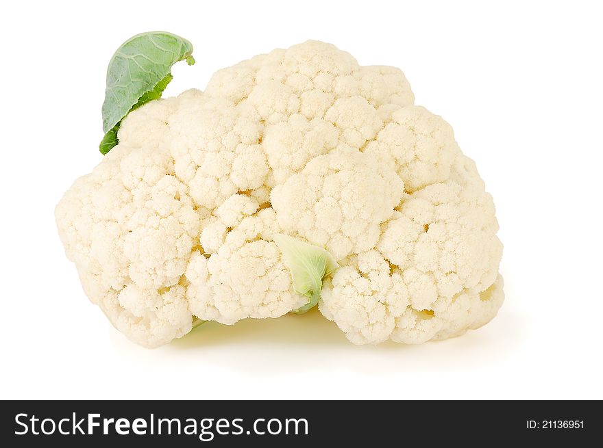 Fresh cauliflower with leaves on a white background