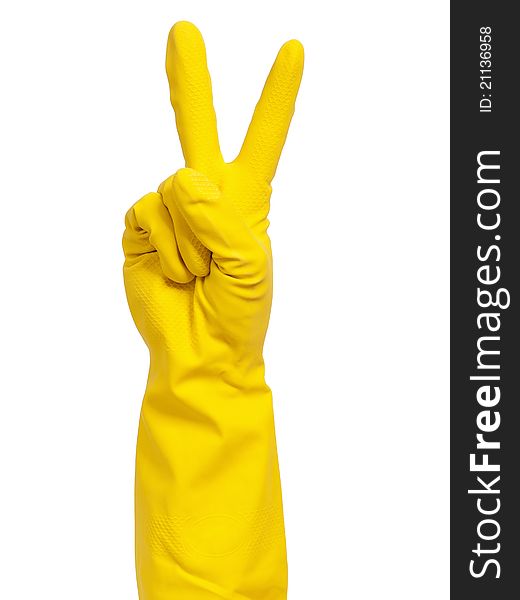 Woman hand in yellow glove making sign - isolated on white background. Woman hand in yellow glove making sign - isolated on white background