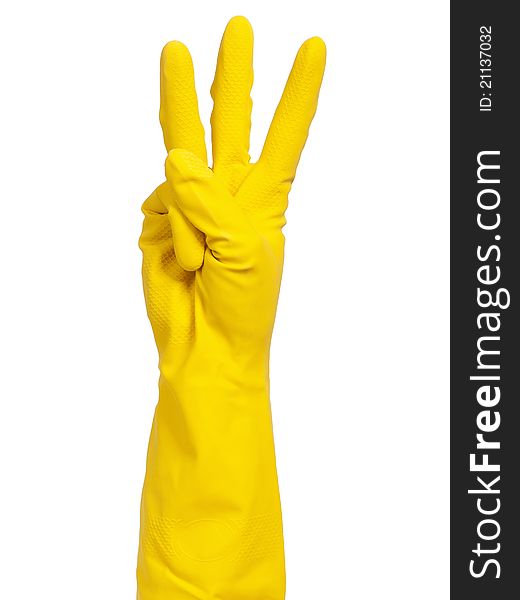 Woman hand in yellow glove making sign - isolated on white background. Woman hand in yellow glove making sign - isolated on white background