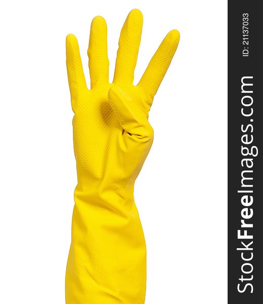 Woman hand in yellow glove making sign - isolated on white background. Woman hand in yellow glove making sign - isolated on white background