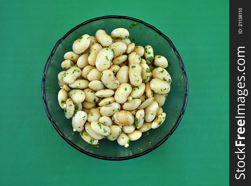 Source bean salad in the foreground takes study