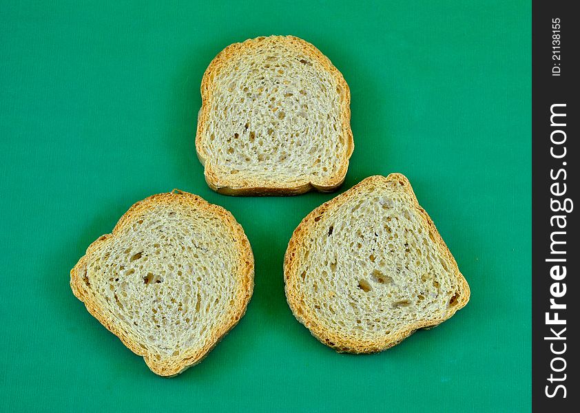Three wheat bread toasted in the foreground