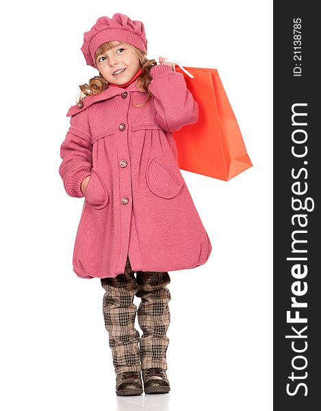 Portrait of a pretty little girl with bag. Isolated on white background.