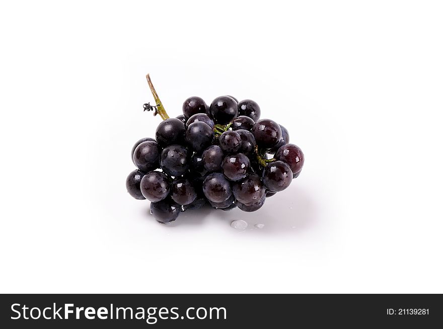 Black bunch of grapes isolated