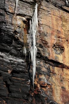 Dripping Frozen Icicles On A Cliff Face Royalty Free Stock Photo