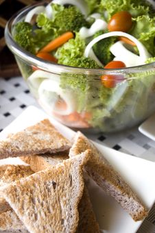Green Salad With Wheat Toasts Royalty Free Stock Image
