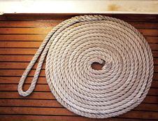 Rope Coil Across Teak Decking Royalty Free Stock Photos Rope Coil Across Teak Decking Royalty Free Stock Photos