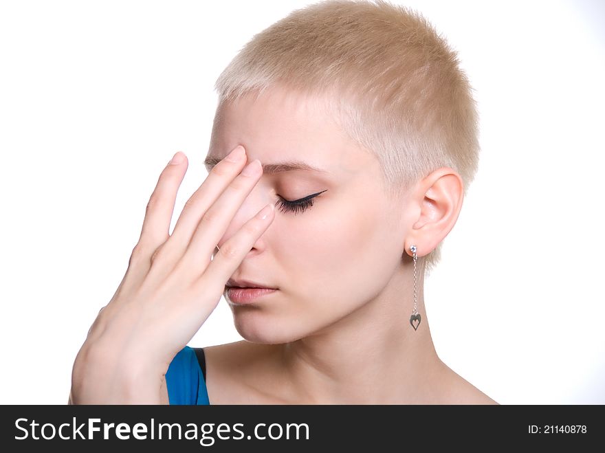 Portrait of the beautiful blonde with short hair isolated on white background