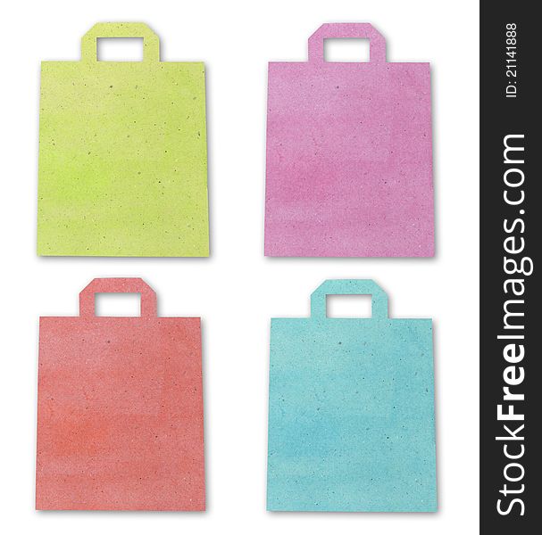 Color shopping bag recycle paper craft stick isolated on white