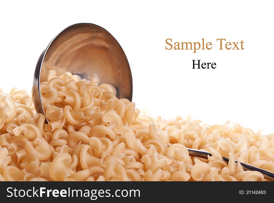 Scoop and raw pasta isolated on a white background