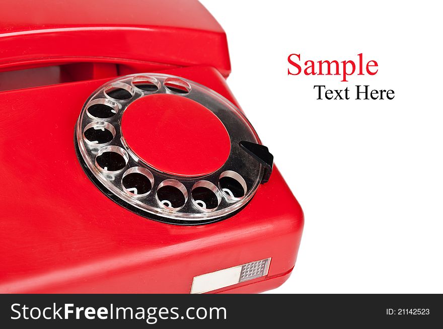 Old and red telephone isolated on a white background. Old and red telephone isolated on a white background