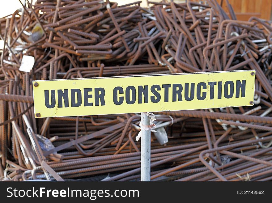 Under construction sign at an industrial sight