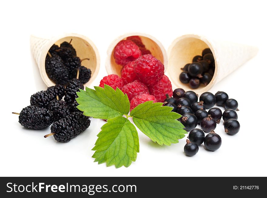 Blueberries and raspberry isolated on a white background