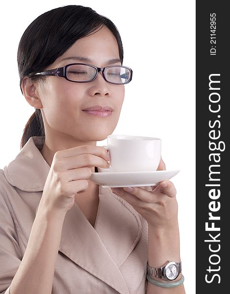 Asian business woman about to enjoy her morning cup of coffee before work isolated. Asian business woman about to enjoy her morning cup of coffee before work isolated