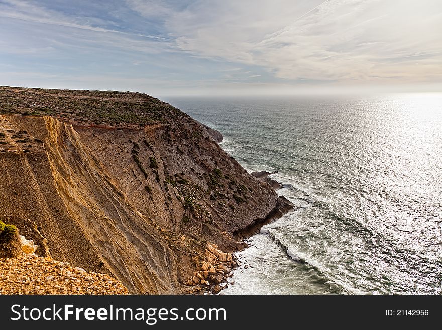 Beautiful cliff over the Atlantic Ocean in region of Sesimbra. Beautiful cliff over the Atlantic Ocean in region of Sesimbra.