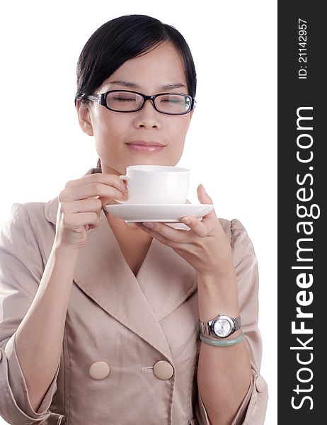 Asian business woman about to enjoy her morning cup of coffee before work isolated. Asian business woman about to enjoy her morning cup of coffee before work isolated