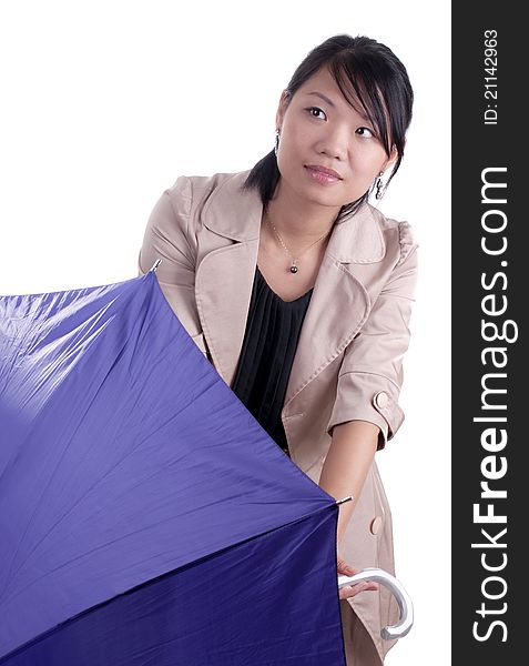 Young asian woman holding umbrella wondering if it will start raining. Young asian woman holding umbrella wondering if it will start raining