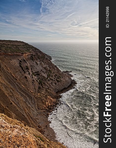 Beautiful cliff over the Atlantic Ocean in region of Sesimbra. Beautiful cliff over the Atlantic Ocean in region of Sesimbra.