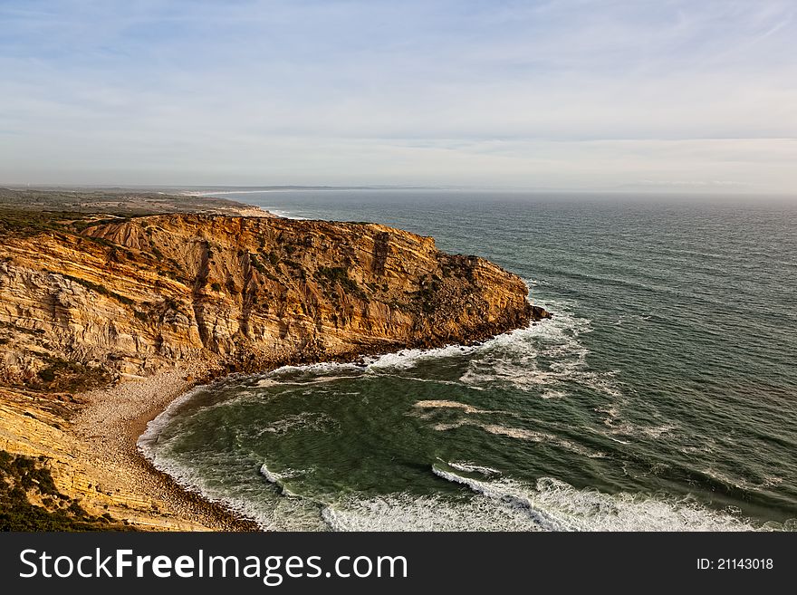 Beautiful cliff over the Atlantic Ocean in region of Sesimbra. Beautiful cliff over the Atlantic Ocean in region of Sesimbra.