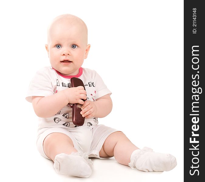 Sweet baby girl holding mobile phone. Isolated over white background. Sweet baby girl holding mobile phone. Isolated over white background