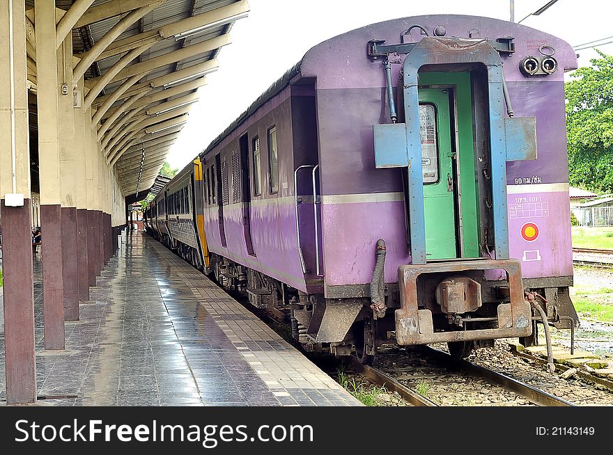 A purple bogie train in platform, Chiangmai train station, Thailand. A purple bogie train in platform, Chiangmai train station, Thailand