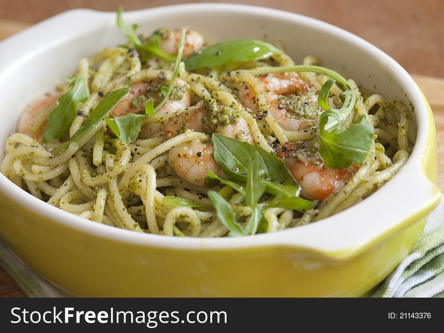 Spaghetti with king prawns and classic basil pesto sauce