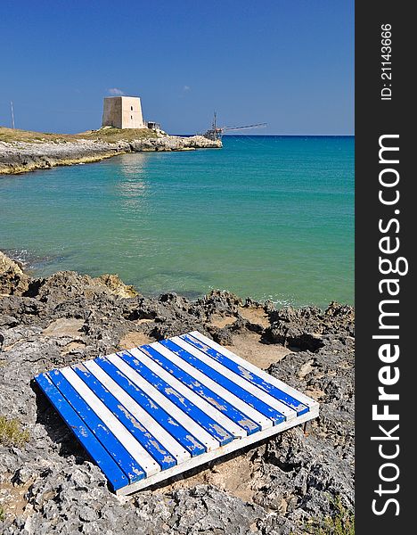 Bay of Manacore, near Peschici, with an ancient Torre Saracena, typical lookout tower of the coast of Gargano. Apulia. Italy. Bay of Manacore, near Peschici, with an ancient Torre Saracena, typical lookout tower of the coast of Gargano. Apulia. Italy.