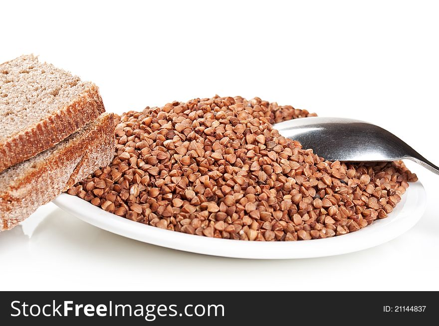 Buckwheat and bread on plate