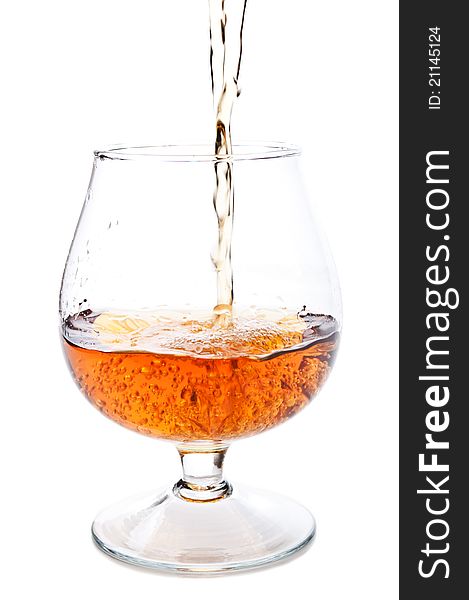 Cognac in a classic glass isolated on a white background