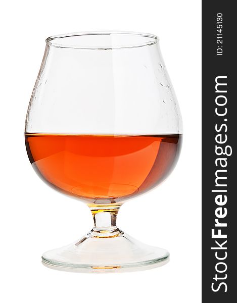 Cognac in a classic glass isolated on a white background