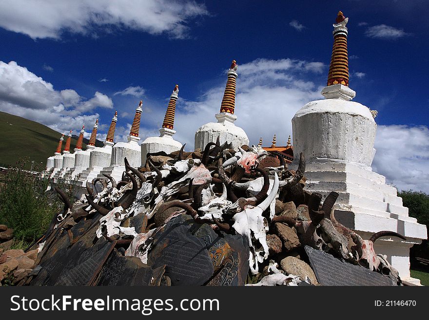 Tibetan prayer towers under blue sky
