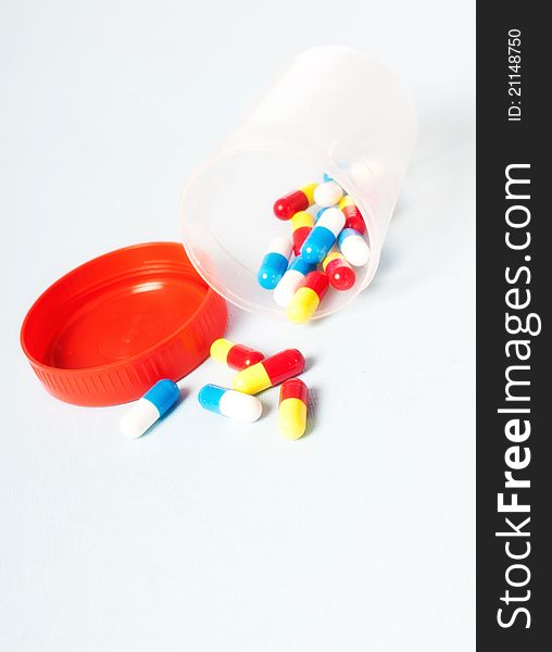 Medical pills on white background