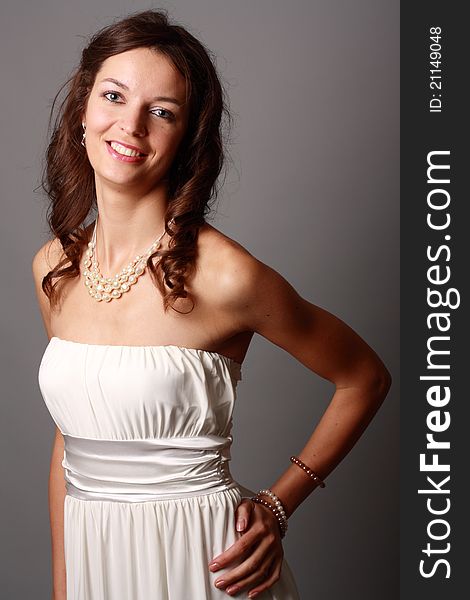 Portrait of a beautiful girl in white dress. Portrait of a beautiful girl in white dress