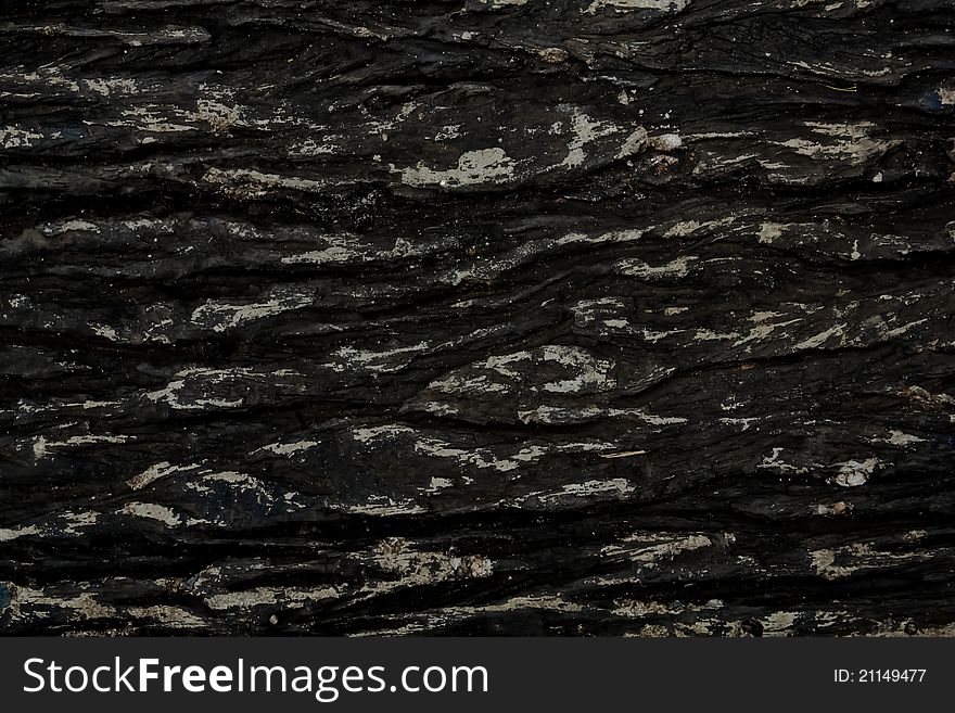 Outdoor black stone wall background