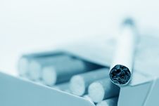 Cigarette Lying On Pack (blue Toned) Stock Image
