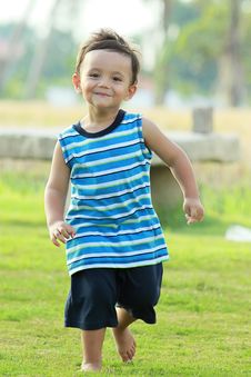 Active Young Boy Smiling And Running Stock Image Active Young Boy Smiling And Running Stock Image