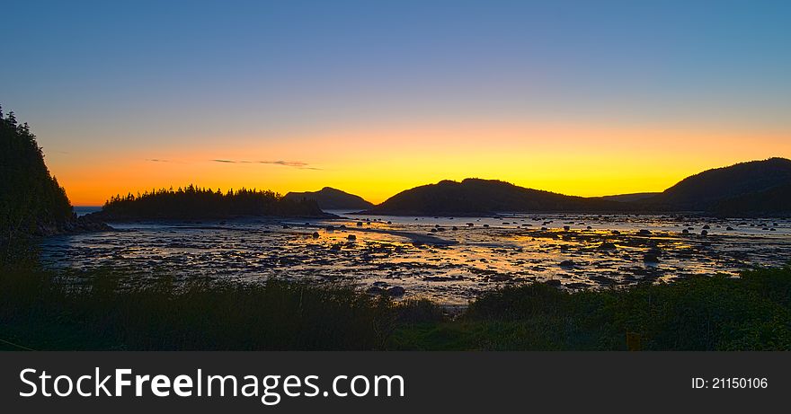 Sunrise In Mountains At Low Tide