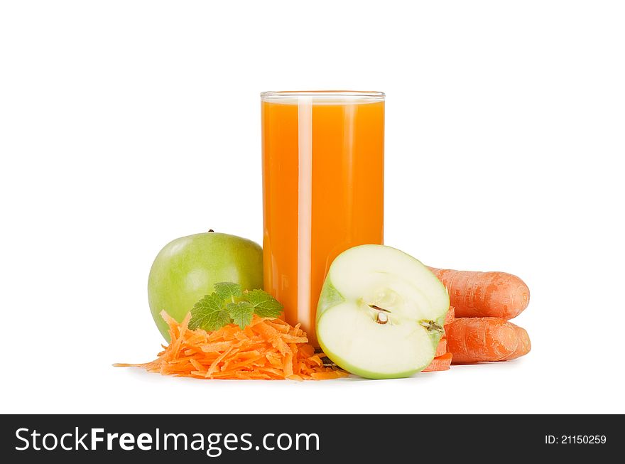 Glass with carrot juice on white