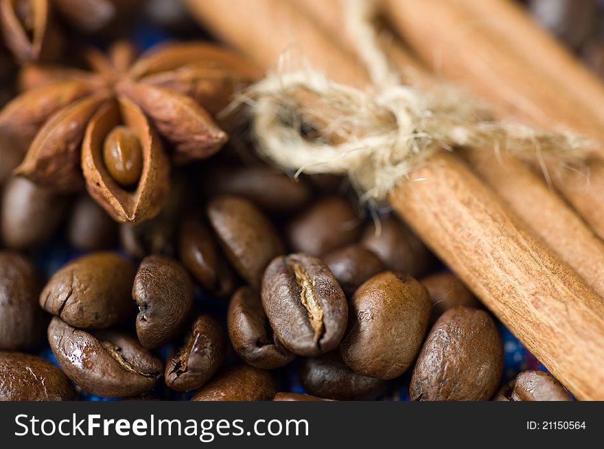 Coffee bean decorated with cinnamon and anise. Coffee bean decorated with cinnamon and anise