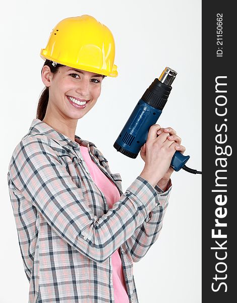 Woman Holding Electric Heater