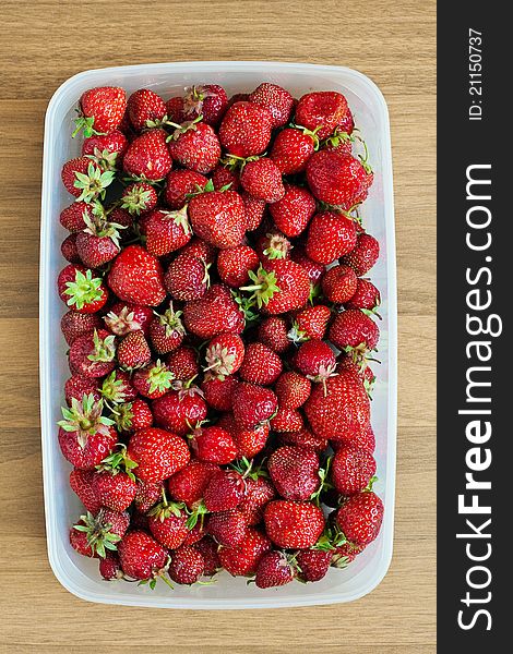 Big heap of strawberries in a bowl