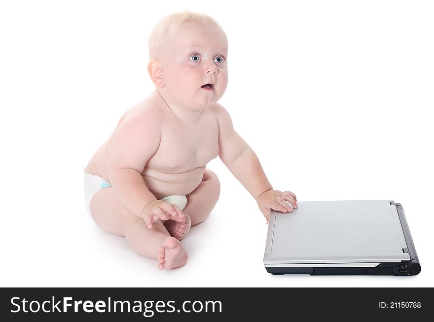 The little baby with the laptop on white