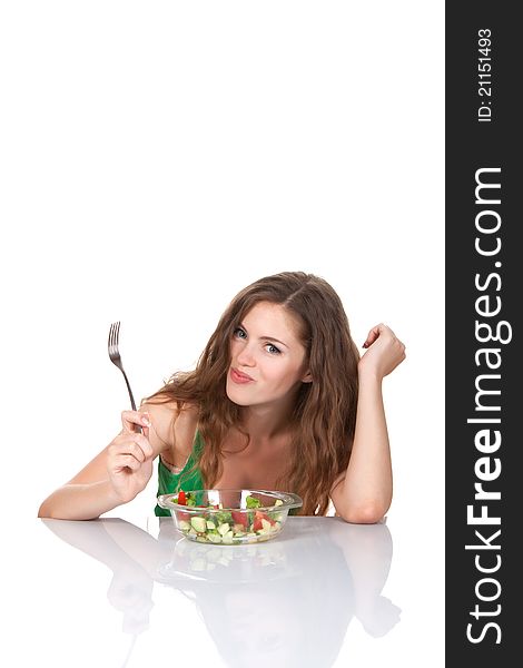 Portrait of attractive young smile woman eating vegetable salad. Portrait of attractive young smile woman eating vegetable salad