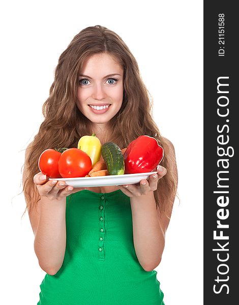 Portrait of young smile beautiful woman eating raw vegetables salad. Portrait of young smile beautiful woman eating raw vegetables salad