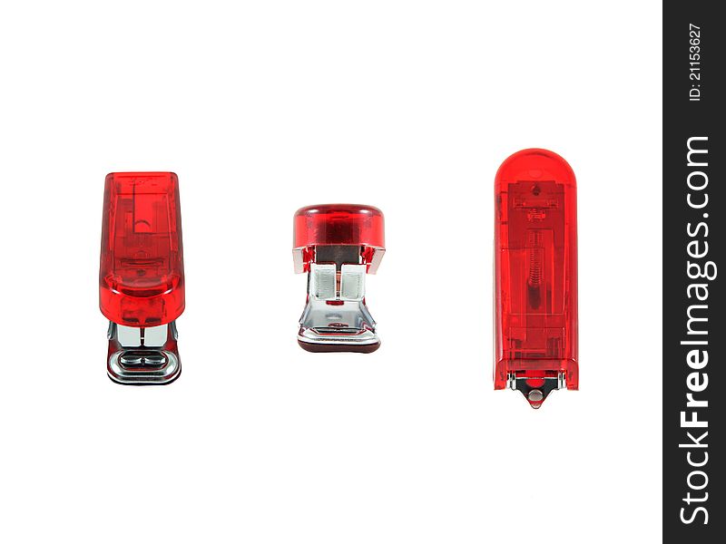Red stapler on white isolate. Red stapler on white isolate
