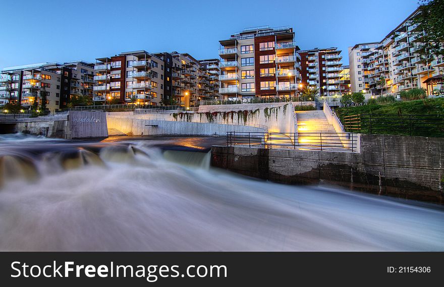 Akerselva river in Oslo is at its largest now, due to high volume in Maridalsvannet. Nydalen complex is in the background. Akerselva river in Oslo is at its largest now, due to high volume in Maridalsvannet. Nydalen complex is in the background