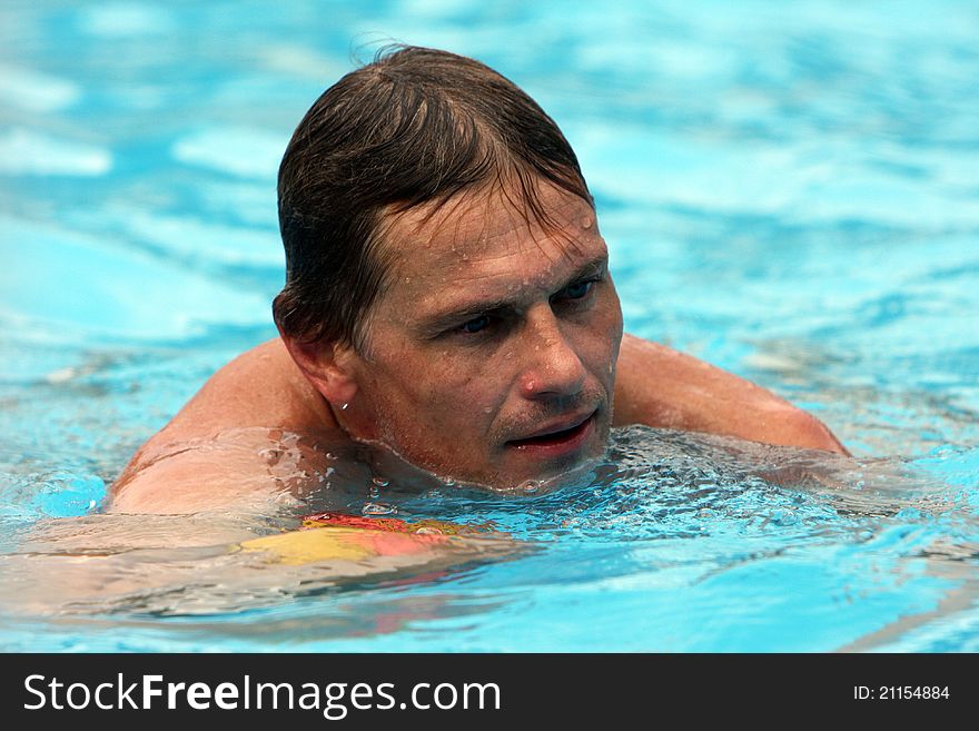 Portrait of man in swimming pool